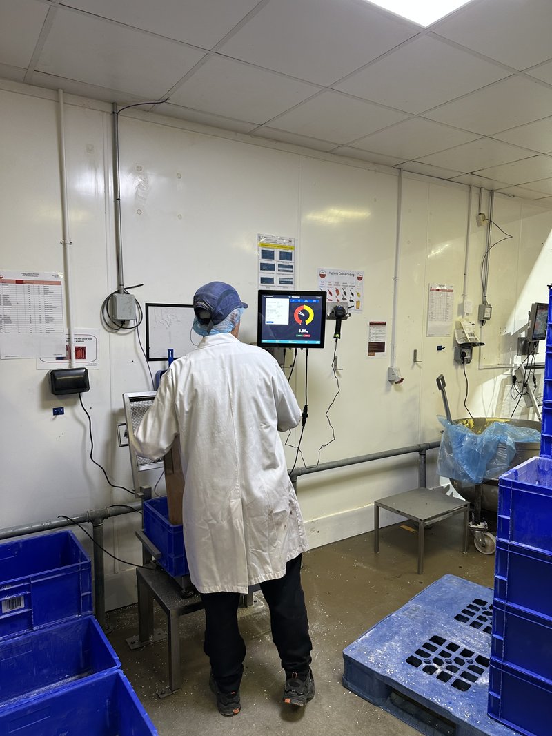 Operator Using Tracesense To Weigh Out a Batch Digitally